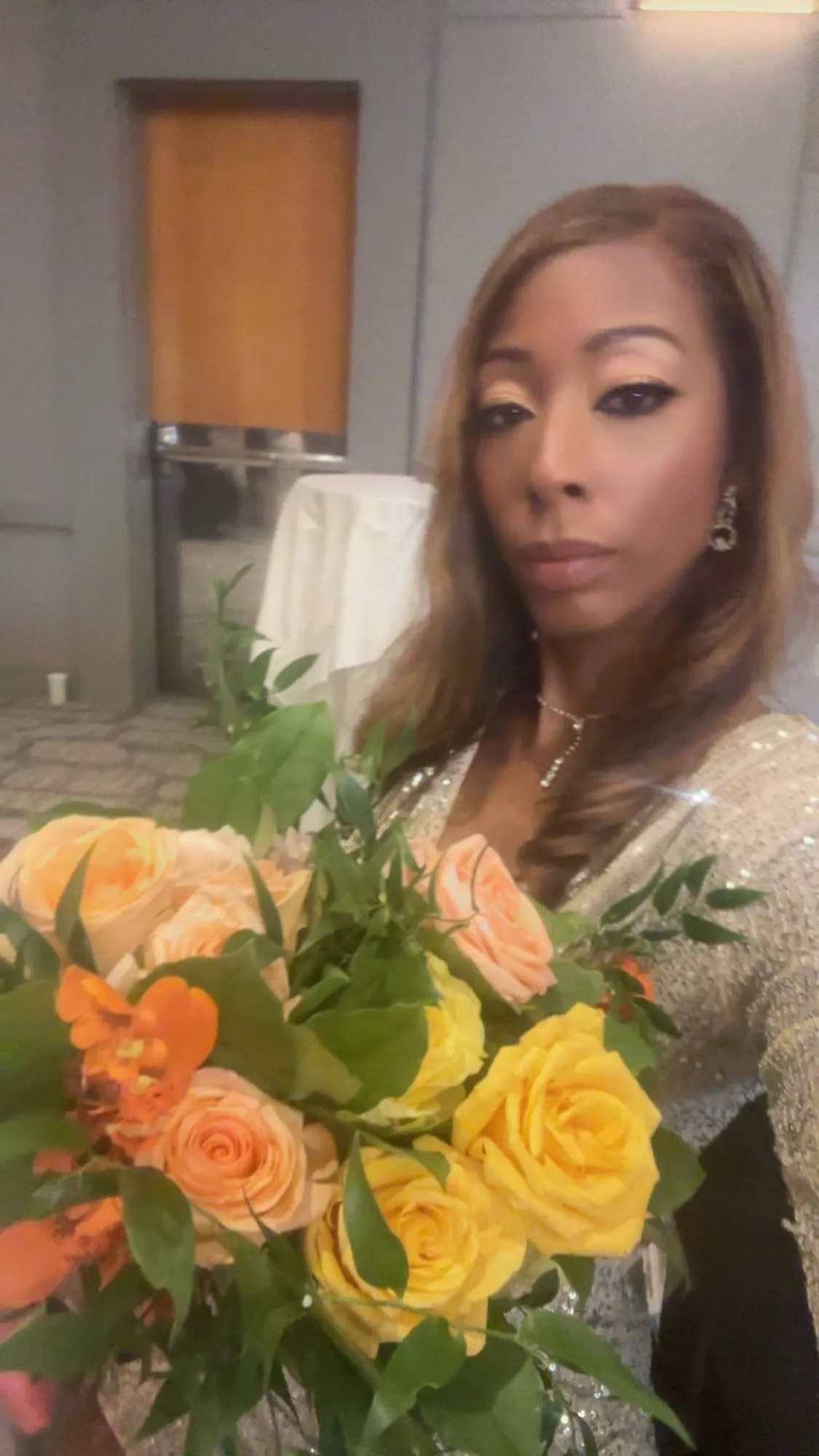 Orange and pink rose arrangement by Greystone