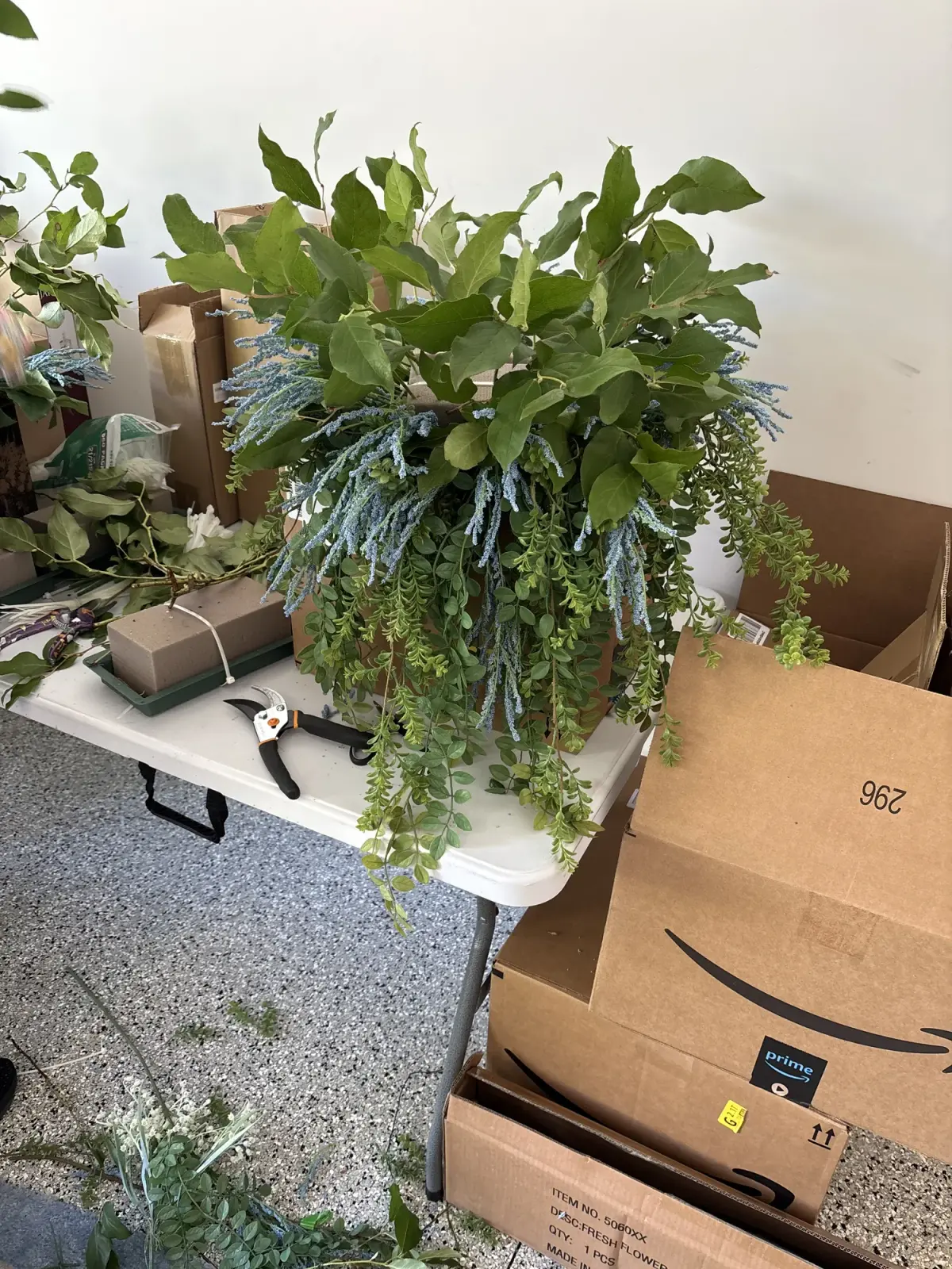 The Greystone team prepping florals ahead of a launch event