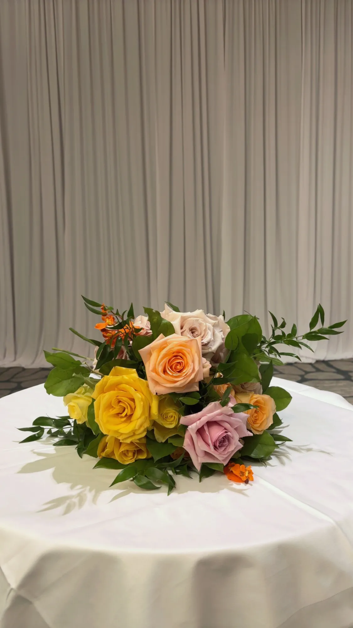 Pastel floral centerpiece by Greystone