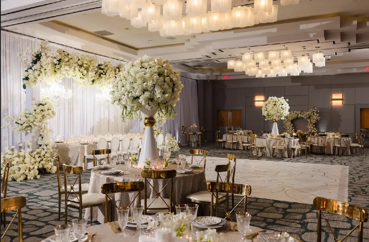 Reception room with gold floral design by Greystone